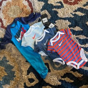 Nike brand baby bundle 6mo sleeper & 3mo onesie 3-pack